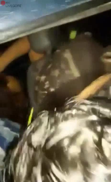 Woman Stuck in Car After Accident, People Laugh and Blast Music - LiveGore.com 